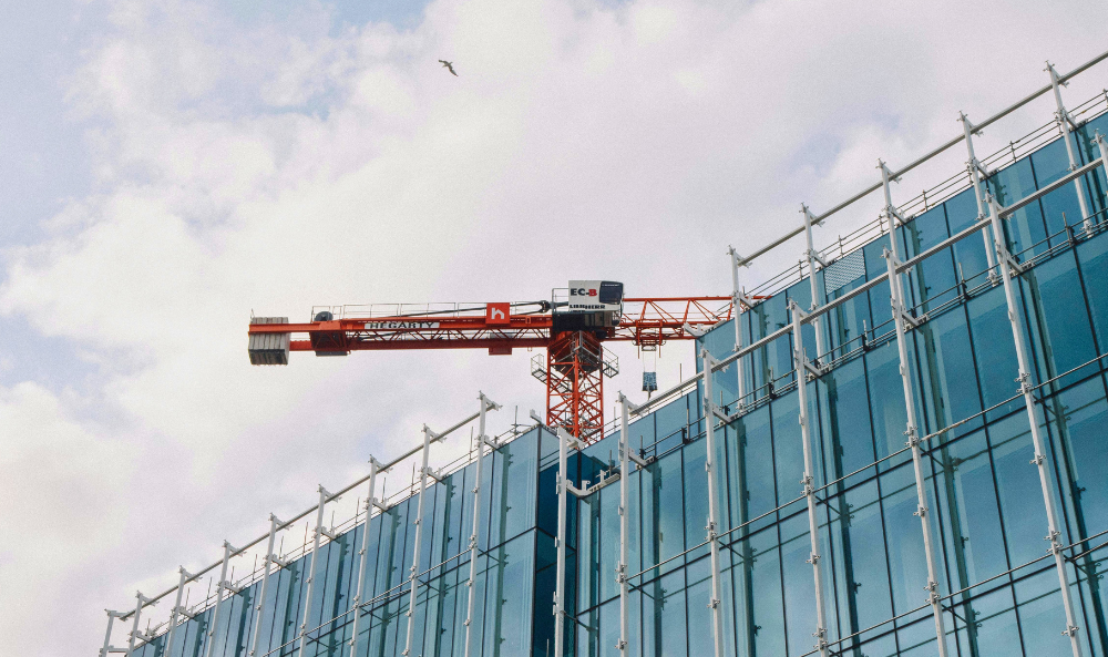Commercial Property Outlook 2026 Return to Optimism hero image, building being built with a crane in the background