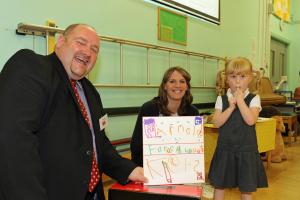 Arnolds Keys North Walsham manager Simon Dale with North Walsham Junior School pupil Scarlett Wilson and teacher Cat Loveridge 1