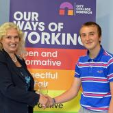 Callum Ellis is congratulated by City College Norwich principal Corinne Peasgood