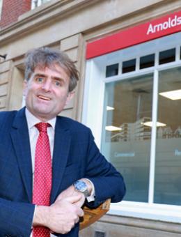 Guy Gowing outside Arnolds Keys new office on King Street in Norwich 500px