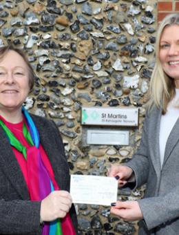 NDAEA chair Jan Hytch left presents a cheque to Jo Gillies Wheatley of St Martins Housing Trust 500px