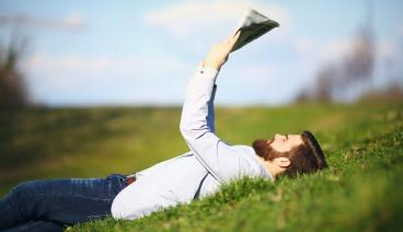 man reading newspaper